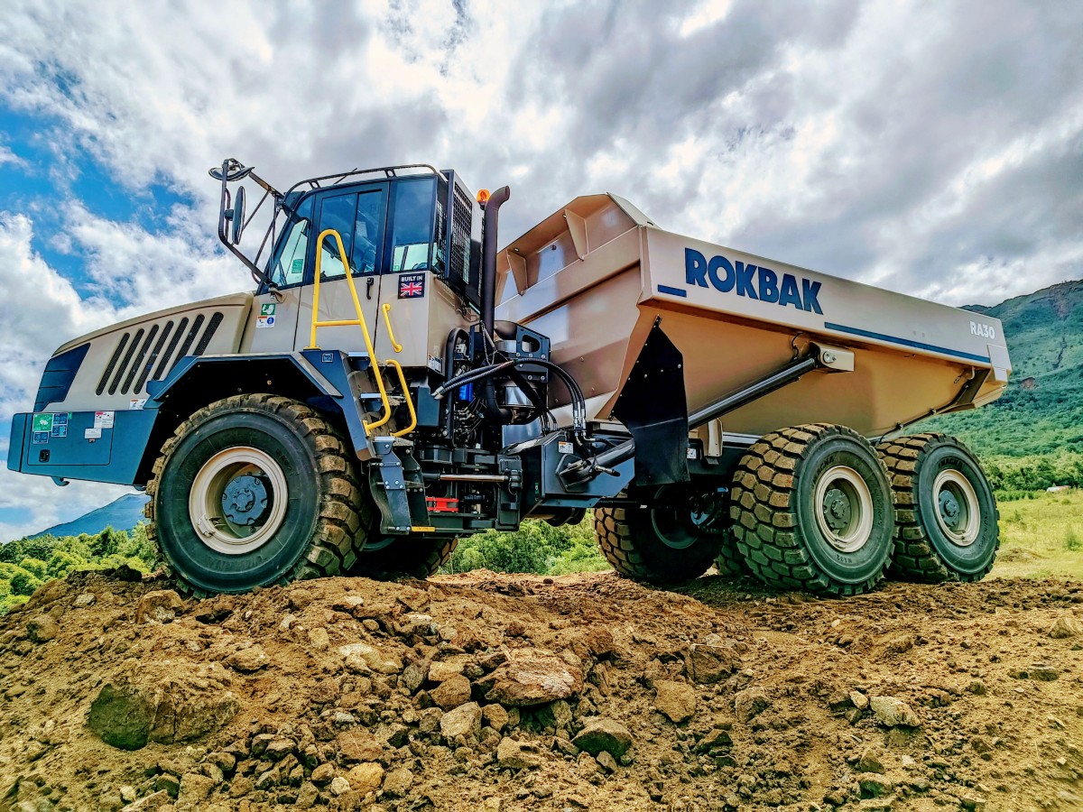 /storage/2024/11/strong-and-stable-ra30-trucks-carry-the-weight-at-new-caledonian-mine_673afa169beb0.jpg