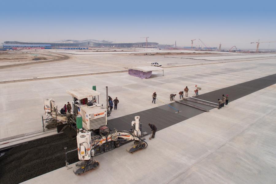 Wirtgen slipform pavers lay precise pavements for Beijing new International Airport
